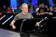 It's Jon Stewart. What's he doing with that chair?